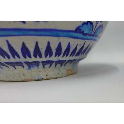 81 - A pair of Middle Eastern style bottle neck vases, painted with flowers and figures to a turquoise gr... 