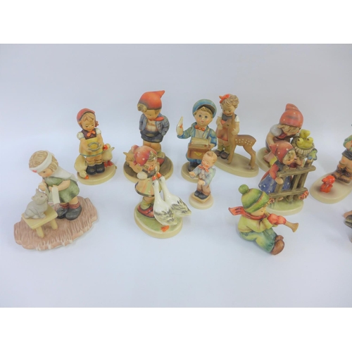 82 - Collection of seventeen various Hummel and Goebel figures to include Little Hiker and Farm Boy etc, ... 