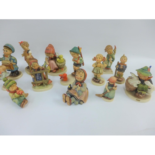 82 - Collection of seventeen various Hummel and Goebel figures to include Little Hiker and Farm Boy etc, ... 