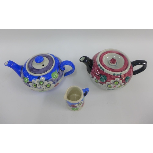 94 - Collection of Mak Merry Scottish floral patterned pottery to include two teapots and a small jug, (3... 