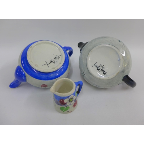 94 - Collection of Mak Merry Scottish floral patterned pottery to include two teapots and a small jug, (3... 