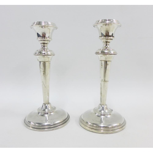 20 - Pair of  silver candlesticks with knop stems and circular footrim, Birmingham 1910, 15cm high (weigh... 