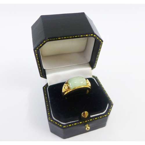 25 - 9ct gold jade ring, full set of 375 hallmarks to inner band, UK ring size P