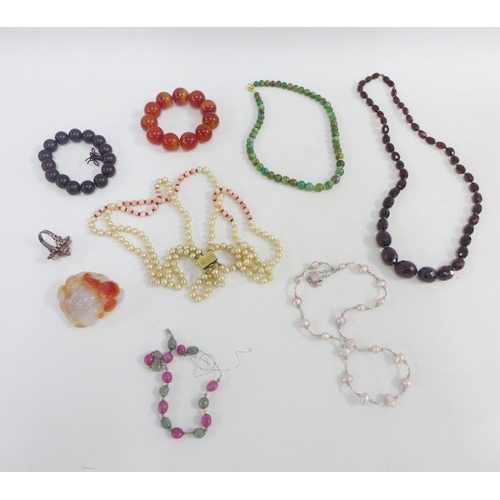 29 - A collection of coloured hardstone jewellery to include beads and a bracelet together with a white m... 
