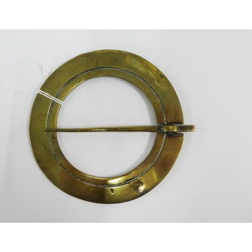 105 - Early Scottish brass Plaid brooch, 11.5cm diameter