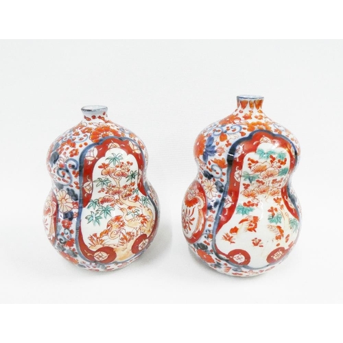 124 - Pair of Chinese Imari double gourd vases, typically painted with birds, flowers and foliage, 16cm hi... 