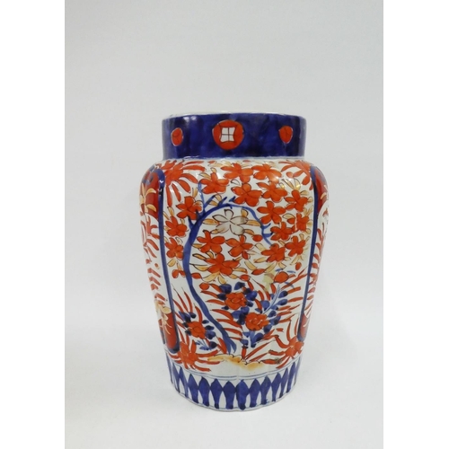 128 - Chinese Imari vase of cylindrical lobed form, typically painted with flowers and foliage (star crack... 