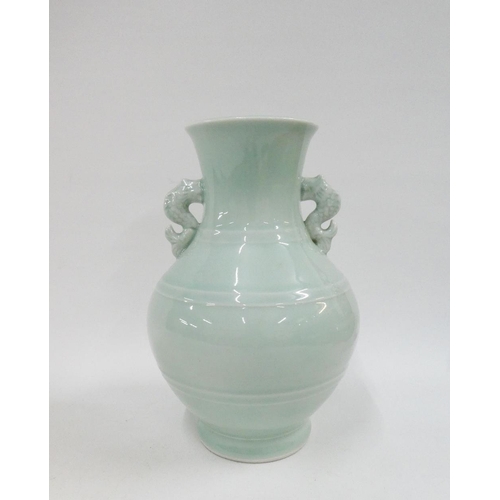 129 - Celadon glazed vase with seahorse handles to side, 26cm high