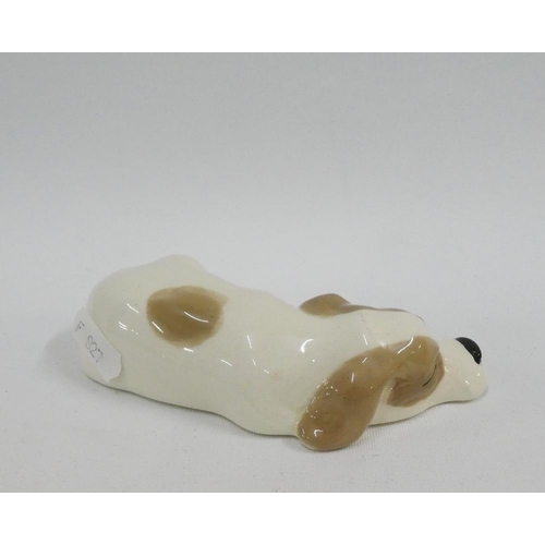 141 - W.R Midwinter sleeping dog figure, with printed backstamps, 14cm long