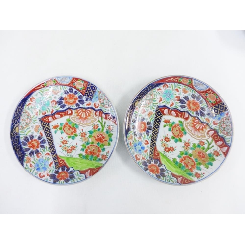 153 - Chinese Imari charger together with a blue and white bowl and a pair of later Japanese plates, (4) l... 