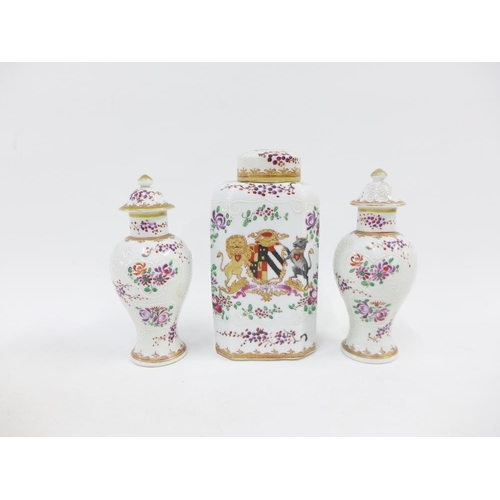 161 - A group of Samson Armorial porcelains to include a tea caddy and cover and a pair of covered baluste... 