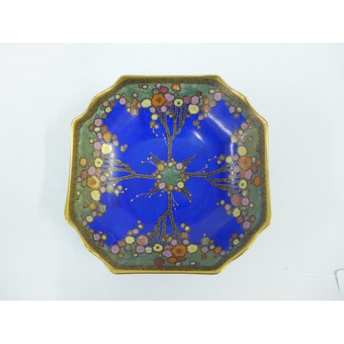 162 - Crown Devon blue glazed bowl of square outline, handpainted with stylised art deco flowers, with pri... 