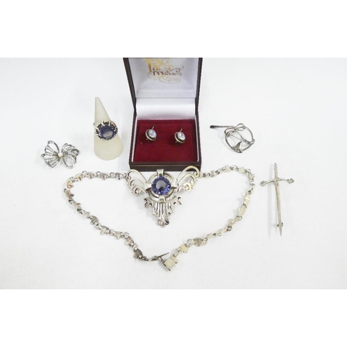22 - A collection of silver and white metal jewellery to include a necklace and matching ring, dagger kil... 