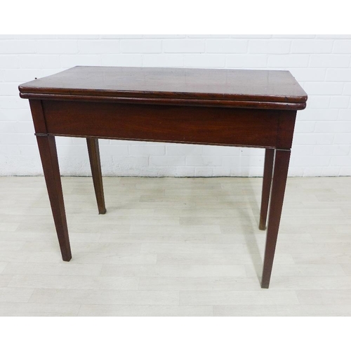 241 - Mahogany fold over table on square tapering legs, 76 x 42cm