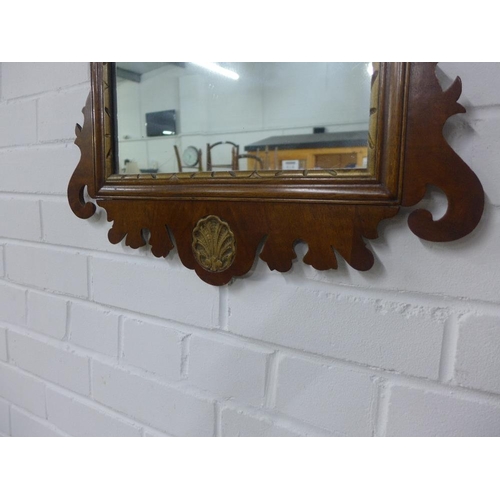 257 - Georgian style mahogany and parcel gilt wall mirror, 82 x 49cm