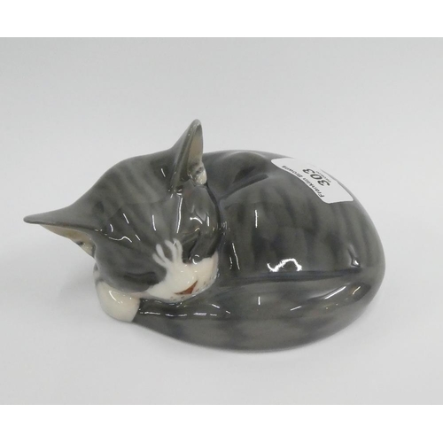 303 - Royal Copenhagen Sleeping Cat figure, printed backstamp and No422, 15cm long