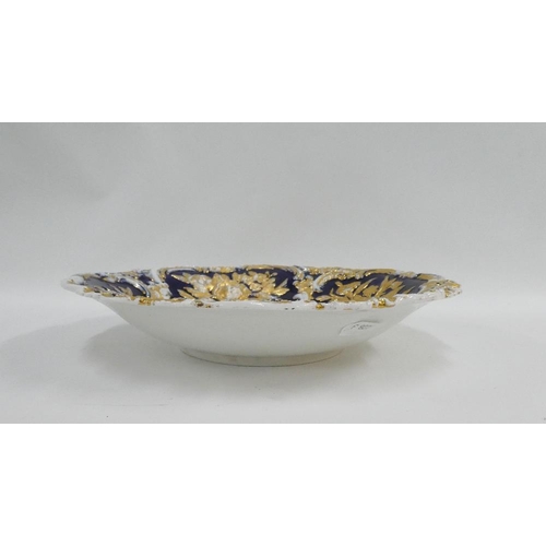 315 - Meissen floral moulded blue, white and gilded bowl / dish, with blue crossed swords mark verso, 31cm... 