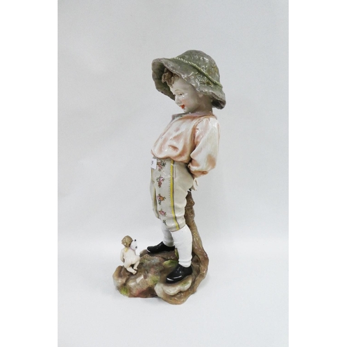 316 - Continental porcelain figure of a boy, modelled standing with a flower fairy at his feet, the base w... 