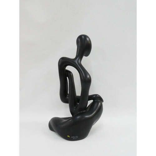 319 - Spanish black glazed abstract figure, signed with monogram CHZ, 40cm high