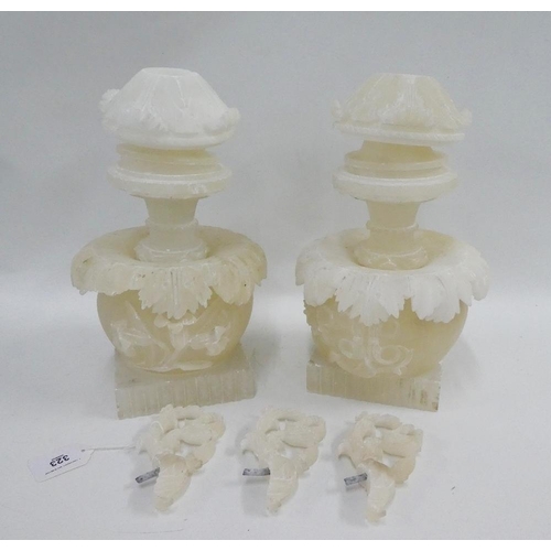 323 - Pair of white alabaster / hardstone sectional vases on square plinths (a/f) (2)