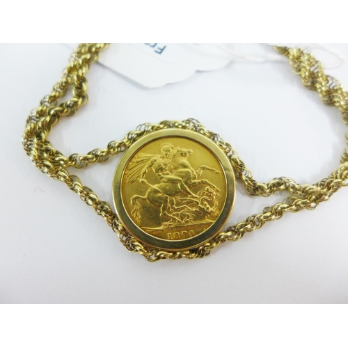 33 - Queen Victoria gold sovereign 1874 in a 9ct gold mount and bracelet