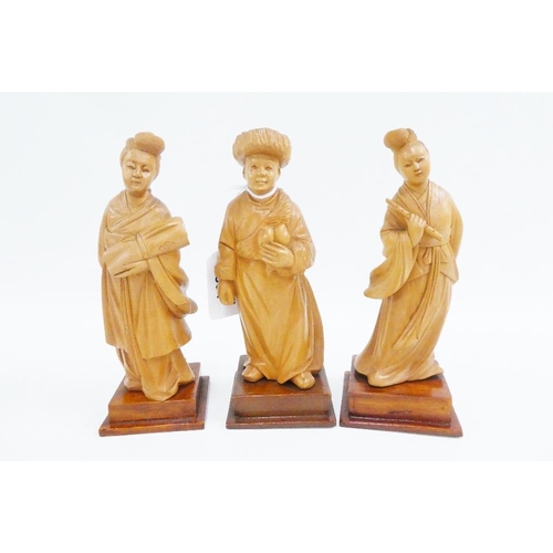 334 - Set of five carved fruitwood chinoiserie figures, on square bases, tallest 15cm (5)