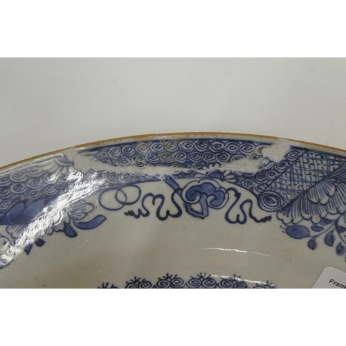 337 - Large Chinese blue and white charger with fisherman pattern to centre, rim restored, 54cm diameter