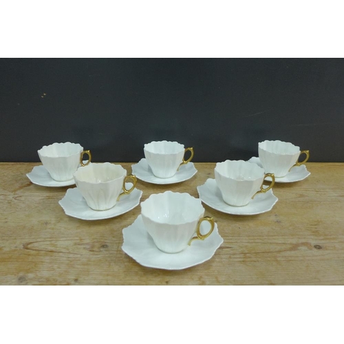 396 - Set of six paragon china white glazed coffee cups and saucers, (12)