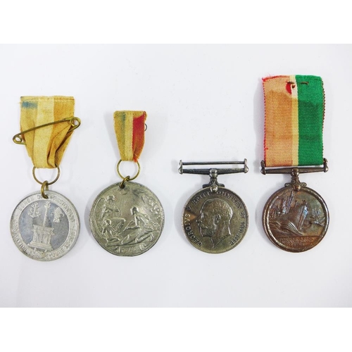 81 - A collection of medals to include WWI Defence and Victory medals awarded to S-22126 PTE T . CLAPPERT... 