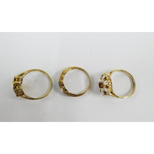 91 - Three 9ct gold gemset dress rings, (3)