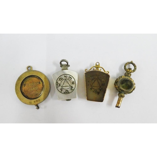 103 - Victorian Masonic gold mounted fob together with another and Masonic medallion and watch key (a lot)