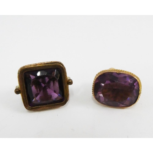 104 - Two amethyst seal fobs, (2)