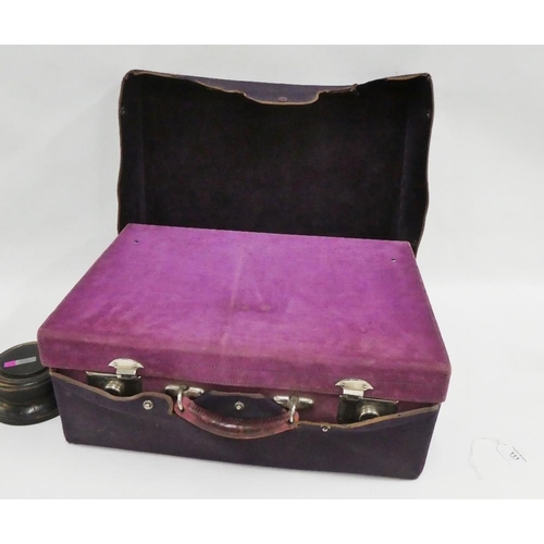 111 - Early 20th century purple suede vanity case containing a part suite of silver and enamel accessories... 