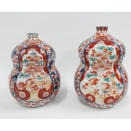 124 - Pair of Chinese Imari double gourd vases, typically painted with birds, flowers and foliage, 16cm hi... 