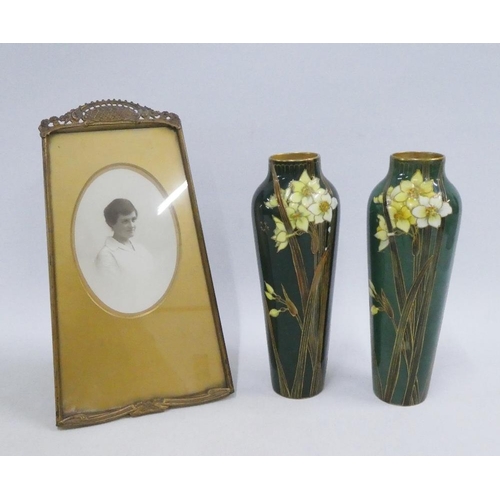 134 - Art Nouveau brass photograph frame, 29cm high,  together with a pair of Doulton Burslem Daffodil pat... 