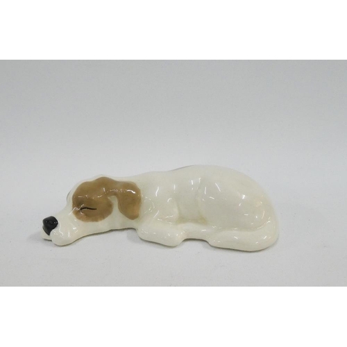 141 - W.R Midwinter sleeping dog figure, with printed backstamps, 14cm long