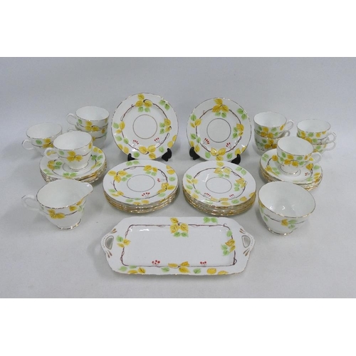 146 - Delphine bone china teaset, nine cups, ten saucers, eleven side plates, cream jug , sugar bowl and s... 