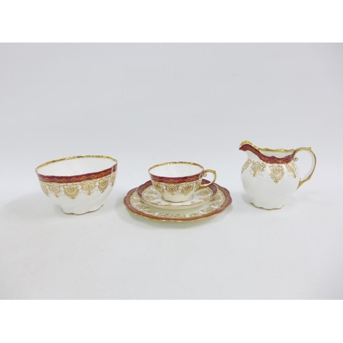 158 - Aynsley twelve place china teaset, with red and gilt borders, (38)