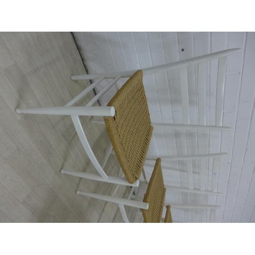 214 - Set of four white painted chairs with woven rush seats, (4) 86 x 43cm