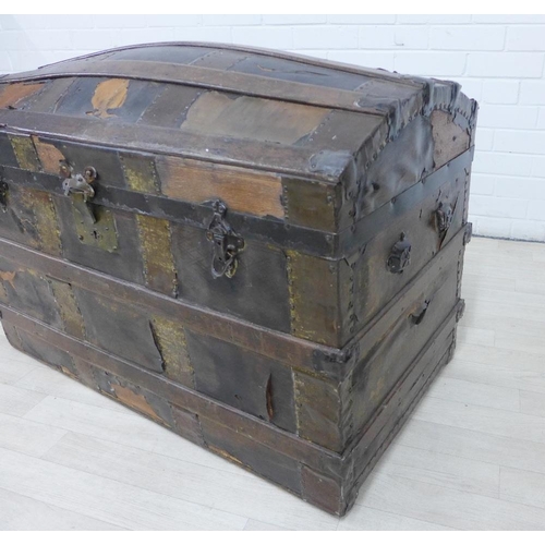 222 - Domed top and brass bound  storage trunk, 62 x 95cm