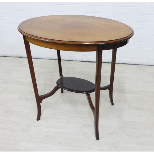 223 - Edwardian mahogany two tier occasional table with oval top, 75 x 77cm