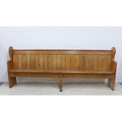 227 - Long pine pew with planked back and shaped side supports, 95 x 240cm