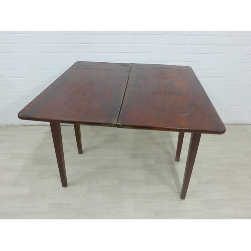 241 - Mahogany fold over table on square tapering legs, 76 x 42cm