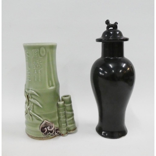 125 - Chinese black glazed vase and cover with dog finial together with a celadon glazed bamboo vase, tall... 