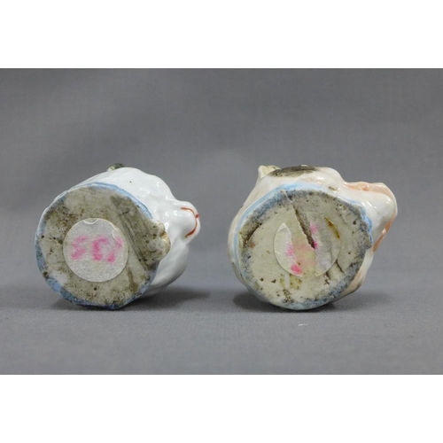 61 - Two 19th century Staffordshire animal head money banks,one of a cat the other of a pig, 5cm high  (2... 