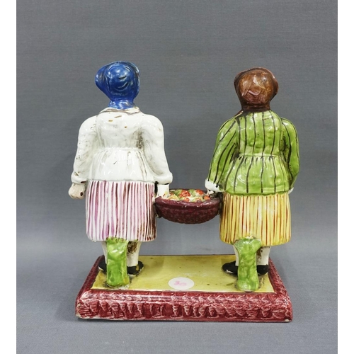 69 - East Coast Scottish pottery figure group of two fishwives, each modelled standing on a rectangular p... 