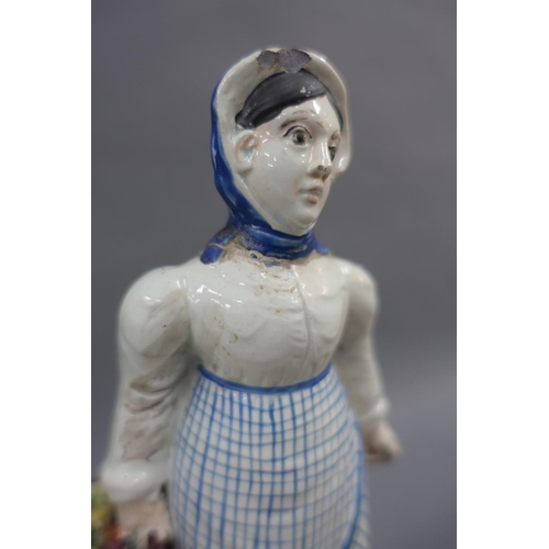 69 - East Coast Scottish pottery figure group of two fishwives, each modelled standing on a rectangular p... 