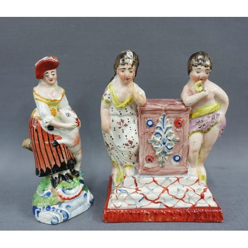 120 - Collection of 19th century Staffordshire figures to include a pearlware figure of a girl and her dog... 