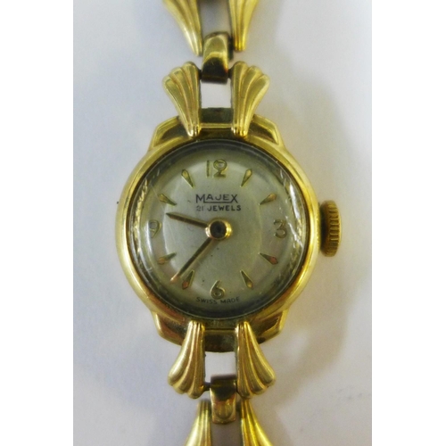 12 - Majex 9ct gold lady's wrist watch on a 9ct gold bracelet strap together with a green leather Rolex b... 