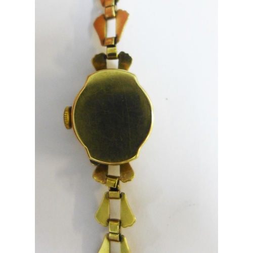 12 - Majex 9ct gold lady's wrist watch on a 9ct gold bracelet strap together with a green leather Rolex b... 